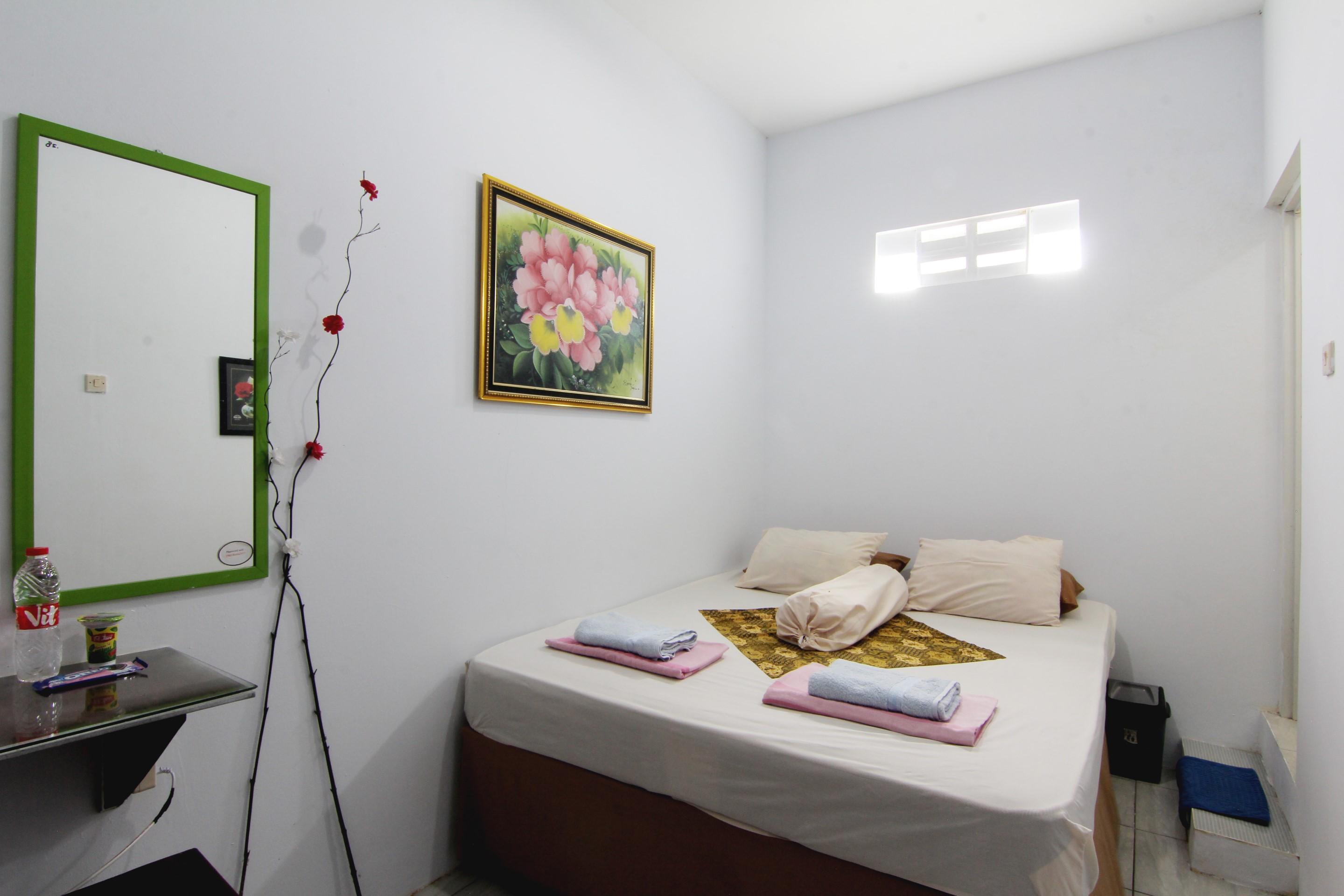 Tiga Dua Homestay Джокьякарта Экстерьер фото