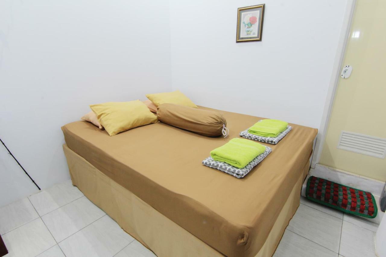Tiga Dua Homestay Джокьякарта Экстерьер фото