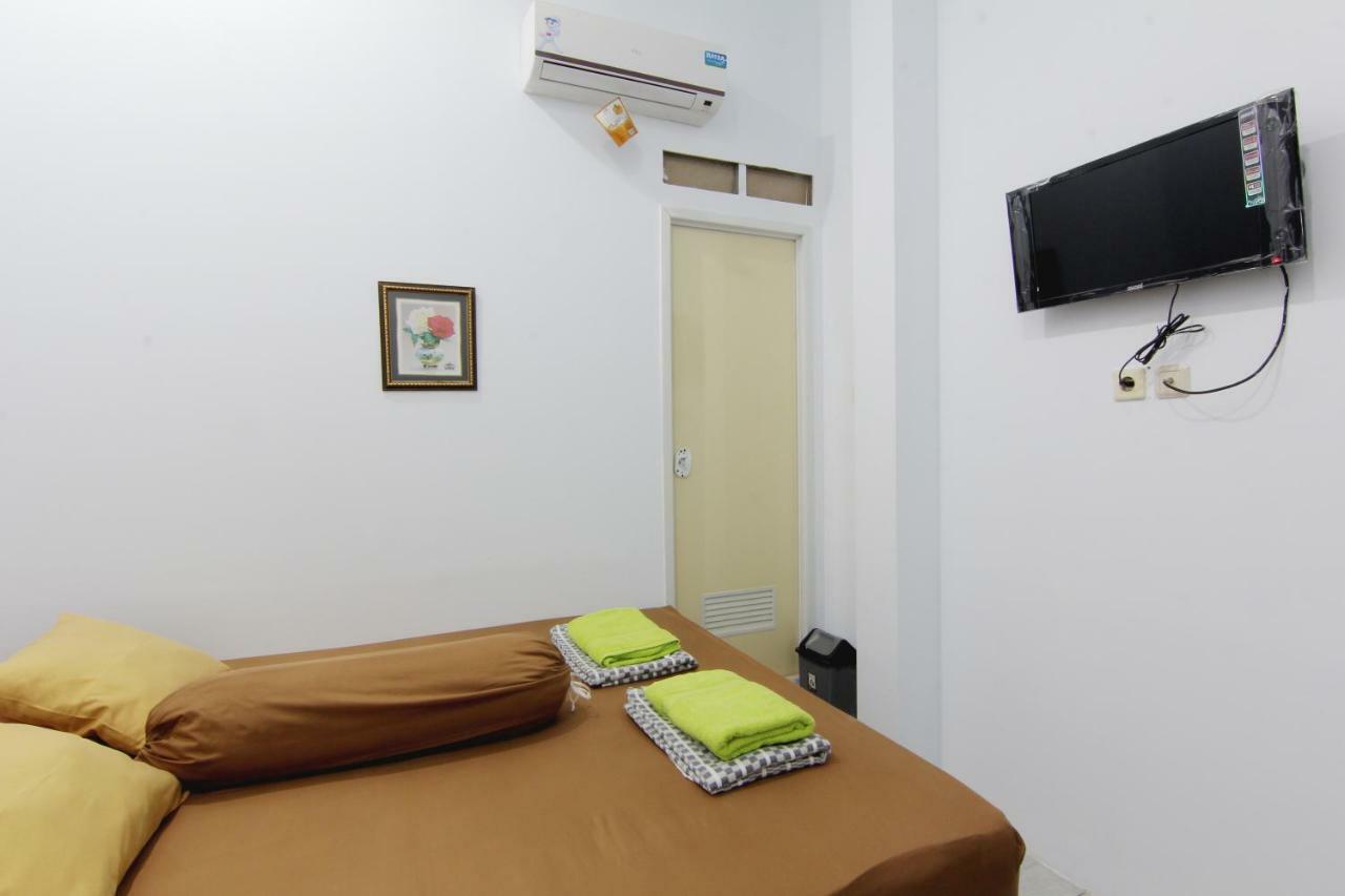Tiga Dua Homestay Джокьякарта Экстерьер фото